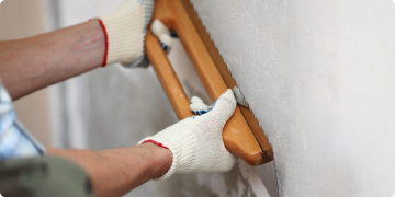 How to smooth plaster walls